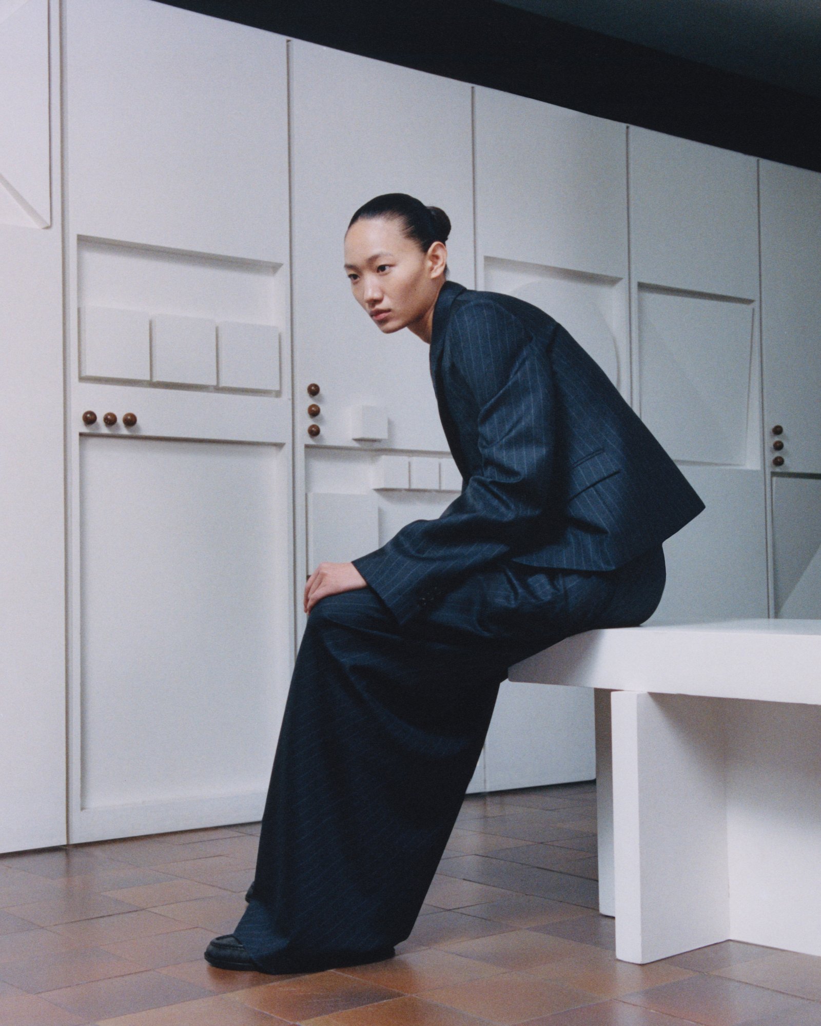 Loewe SS25 Online Stories Woman in a black suit